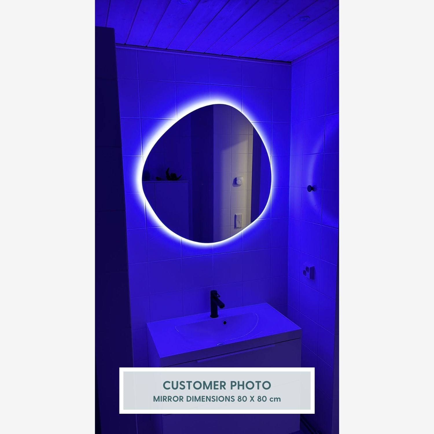 Cliff Mirror with colour-changing backlighting