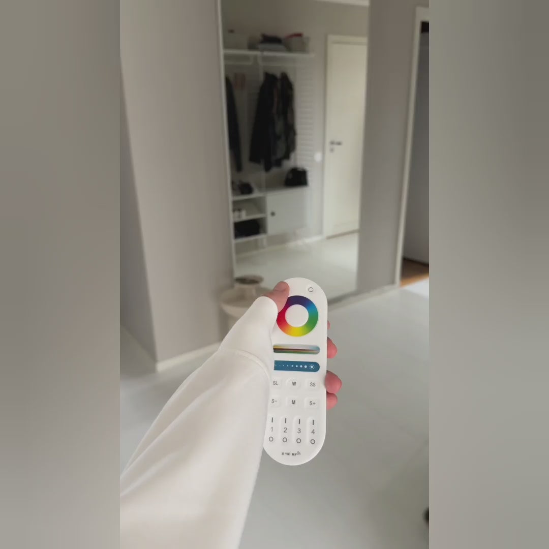 Load video: Slimline Mirror with white frame and colour-changing backlighting